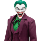 Mezco One:12 Collective The Joker Golden Age Edition action figure in vibrant purple suit and green hair.